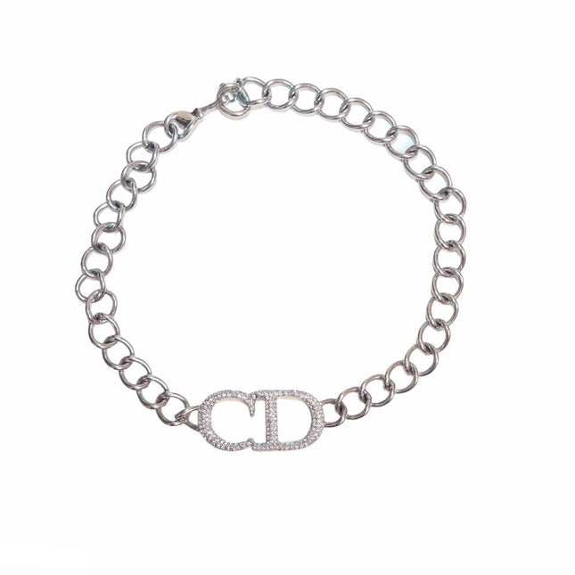 Christian Dior choker necklace in silver with the CD letters studded with crystals.