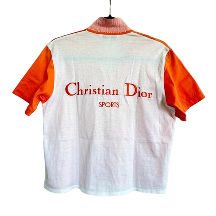 Christian Dior SPORTS women's polo shirt with 3 buttons and collar, Christian Dior Sports embroidered in orange on back center, front is orange color and backside is white