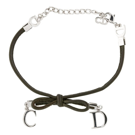 Dior bow tie choker necklace in black and silver C on one end of the necklace D on the other end of the bow tie knot with silver fastener