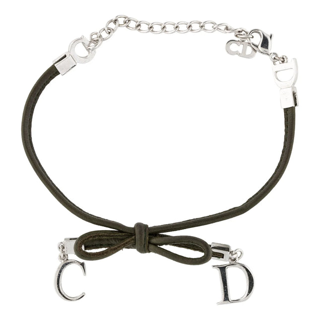 Dior bow tie choker necklace in black and silver C on one end of the necklace D on the other end of the bow tie knot with silver fastener