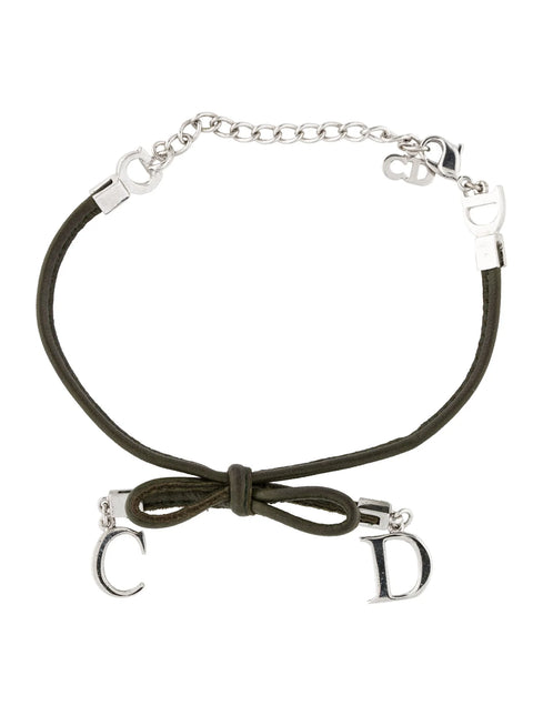 Dior bow tie choker necklace in black and silver C on one end of the necklace D on the other end of the bow tie knot with silver fastener