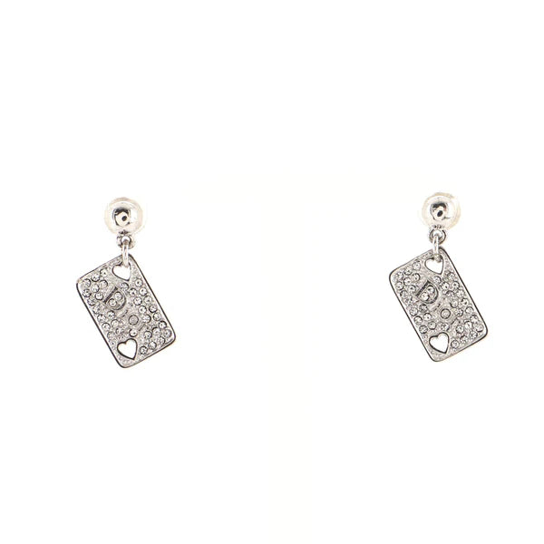 Dior hearts playing cards earrings with crystals, says Dior in center