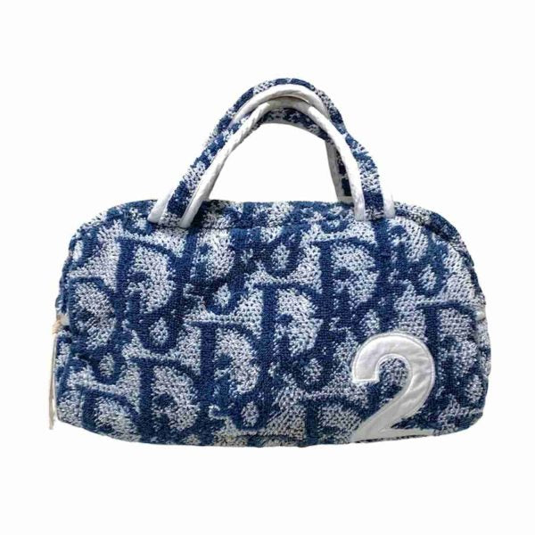 Blue and white Dior trotter terry towel cloth bag with repeating Dior monogram logo going around bag and the number 2 on the bottom right hand corner of the front of the bag