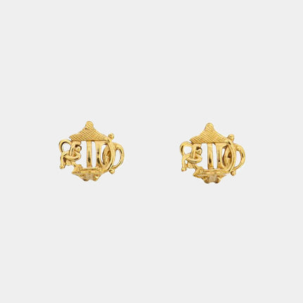 Backside clip closure of Christian Dior clip earrings in the shape of the original intricate monogram design.