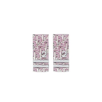 Clip on Dior trotter earrings with Dior monogram the number 2 and 2 stripes across earrings in pink and white enamel inlay